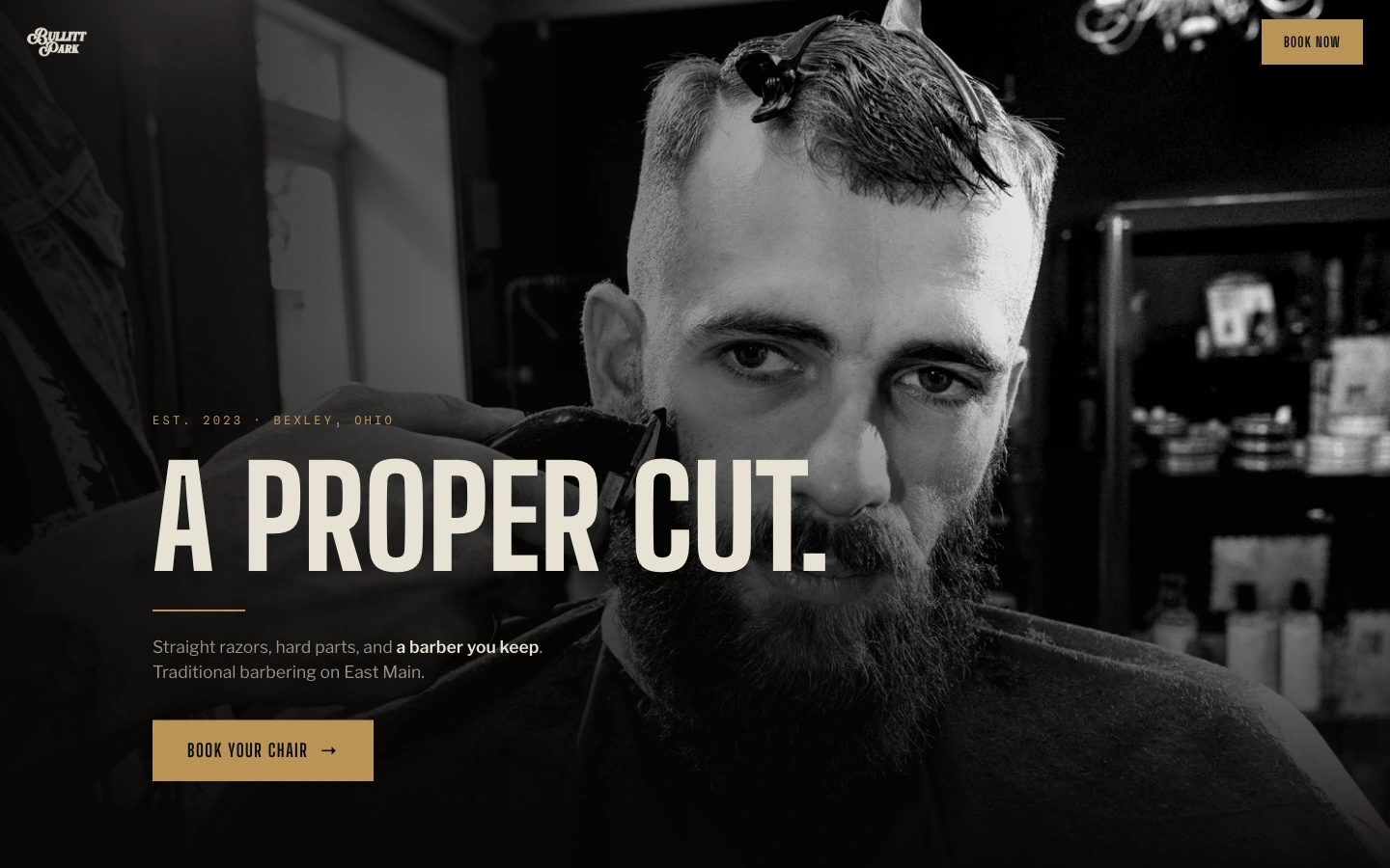 Bullitt Park Barber homepage in a MacBook Pro display